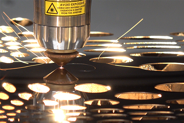 close-up of cutting reflective metal with IPG LaserCube